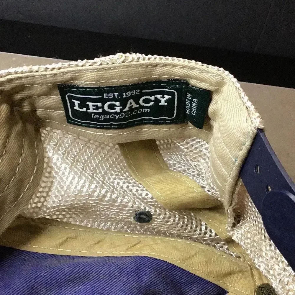 Vintage legacy ladies, trucker hat. She’s a pistol.